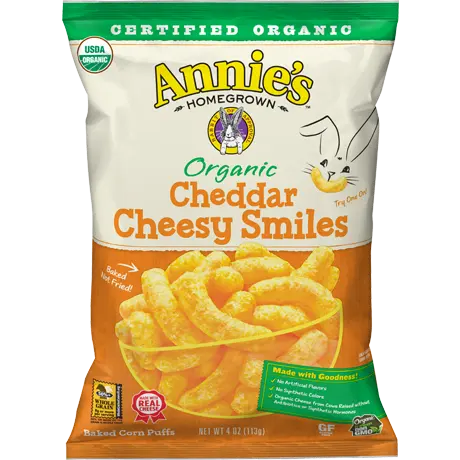 Annie's Organic Cheddar Cheesy Smiles Puffs, front of bag.