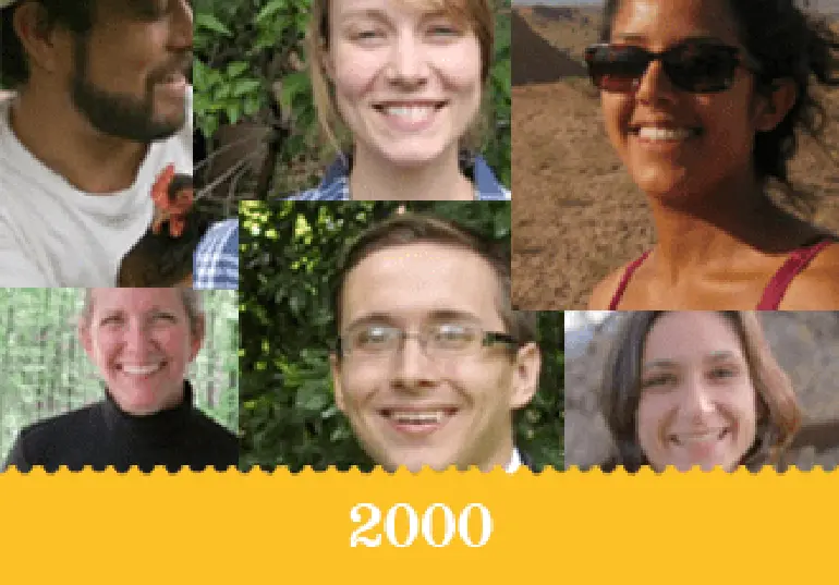 Year 2000 - An assortment of smiling students' faces.