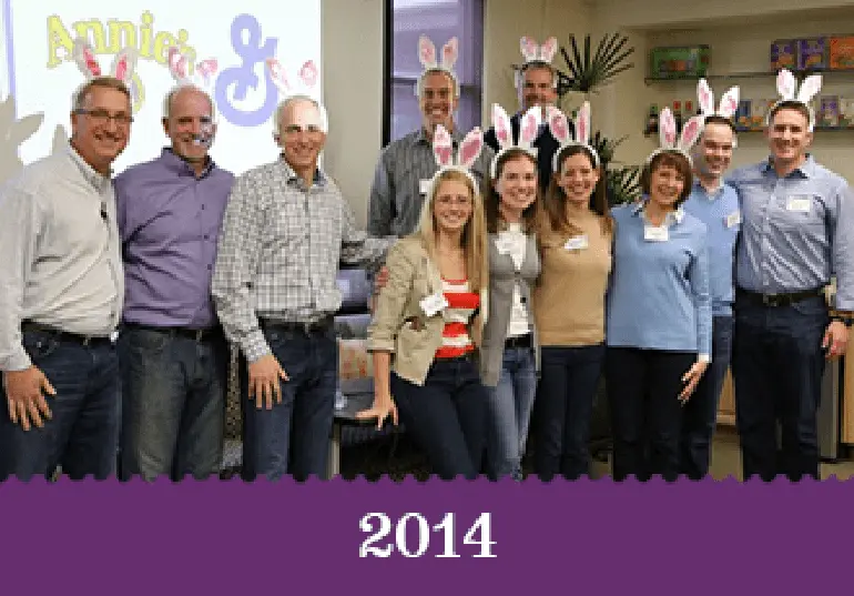 Year 2014 - Both Annie's and General Mills staff standing together wearing bunny ears.