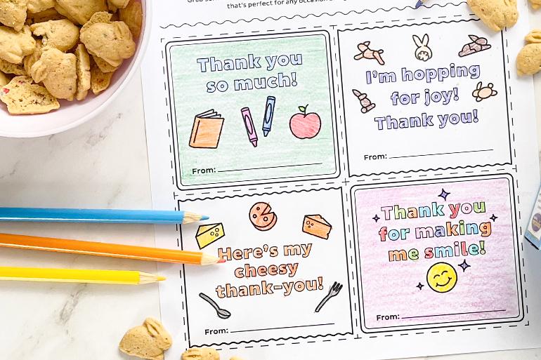 A zoomed in, colored in view of Annie's "There's a thank you note for every bunny" coloring activity sheet with single Bunny Grahams and colored pencils.