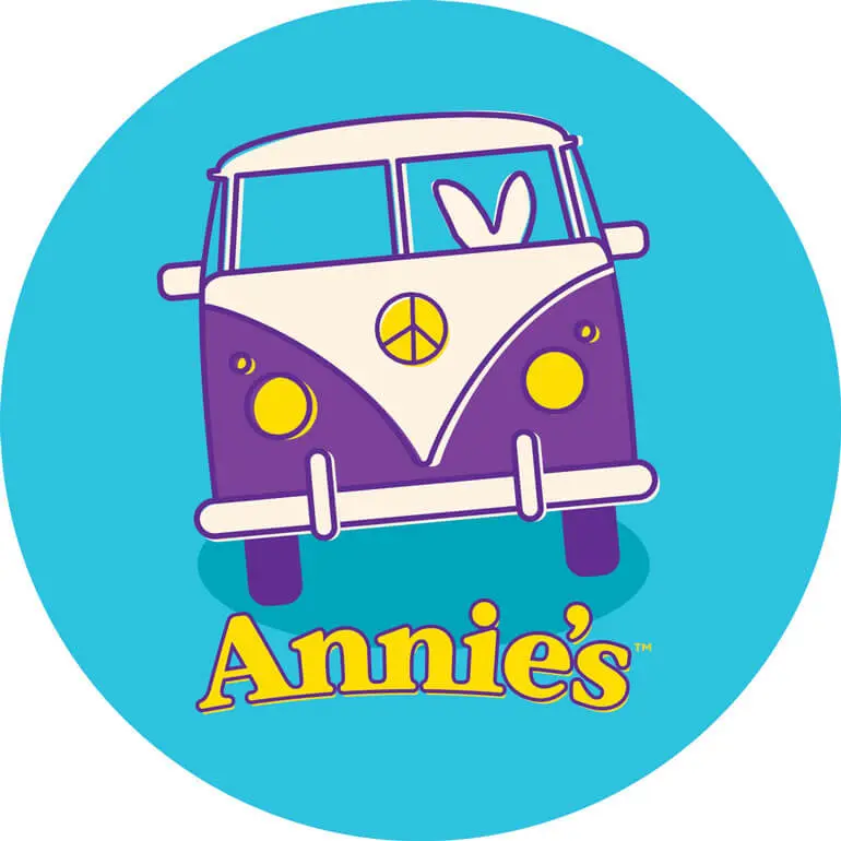 Round blue sticker with a van with bunny ears in the driver's seat and the Annie's logo.
