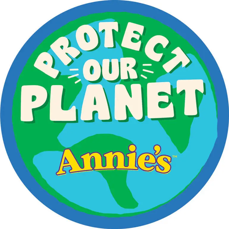 Round green and blue sticker with the Earth, the text "Protect Our Planet", and the Annie's logo.